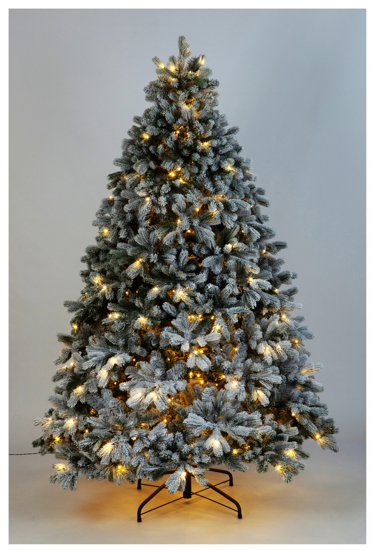 Crystal trees Ель искусственная Мольвено в снегу с вплетенной гирляндой 215 см